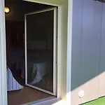 ゲストハウス Dormire Caldi